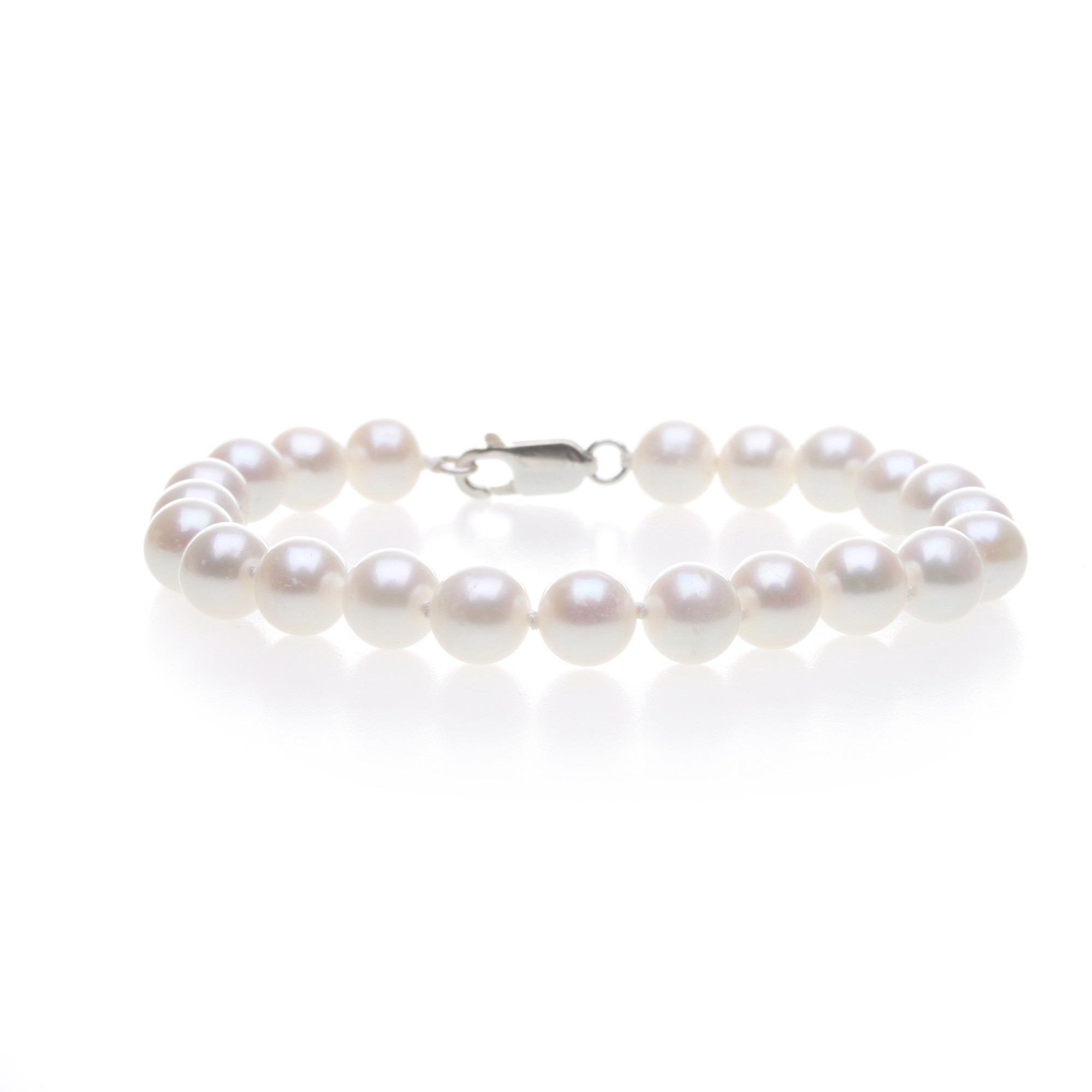 bílý perlový náramek AA 7 mm